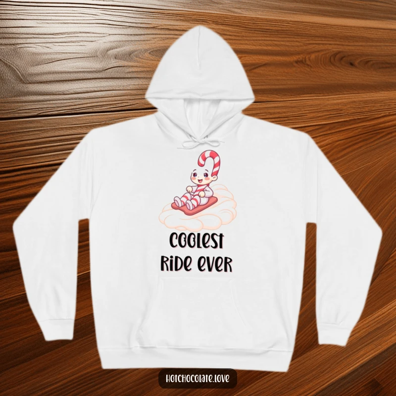 Funny hoodie featuring a delighted candy cane person sliding down a generous swirl of whipped cream, perfect for cozy holiday humor.