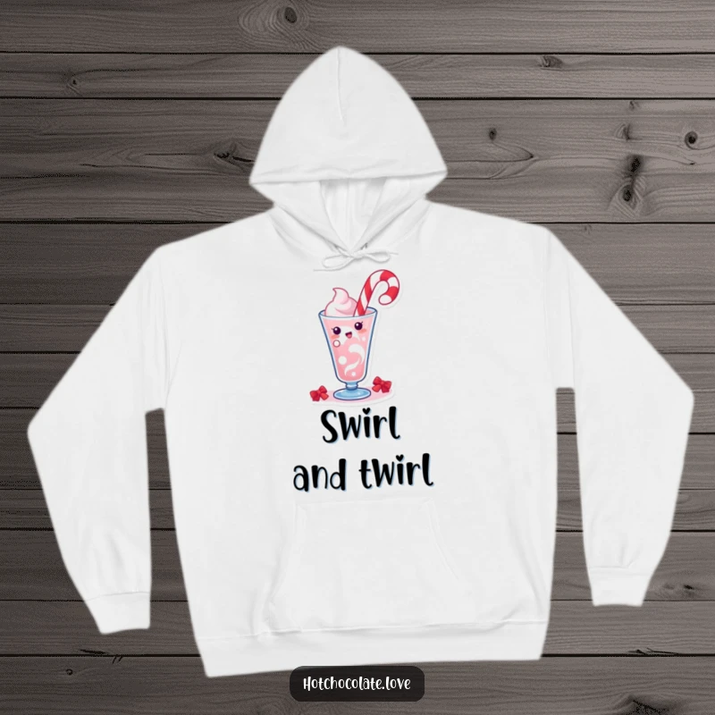 Funny hoodie depicting a happy candy cane character doing a merry swirl in a drink, celebrating the holiday season with joy.